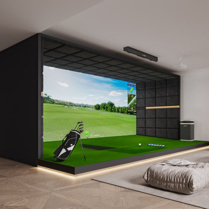 Indoor setup of the Golfjoy GSV Max overhead launch monitor with a golf bag, large screen, and a hitting mat.
