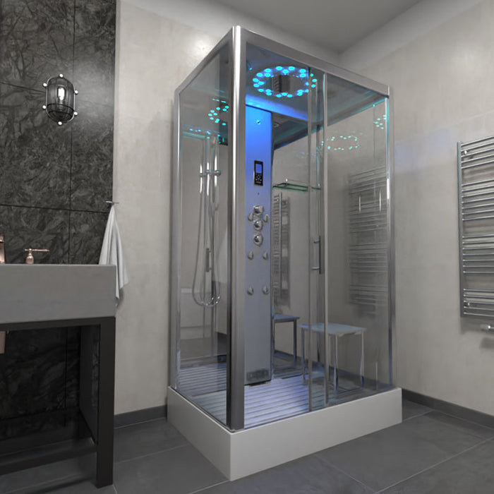 Chrome frame Insignia 1050 x 850 steam shower in a luxury bathroom with overhead LED monsoon lighting and glass door.