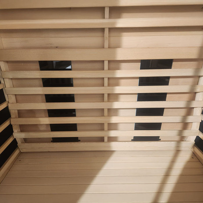 Detailed close-up of the Jaquar infrared sauna’s backrest and evenly spaced heater panels for balanced heat distribution.