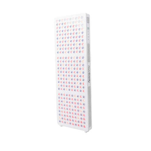 Angled view of Nuvibody LITE 1500 Red Light Therapy Panel showing dual-spectrum LED lights for red and near-infrared therapy.