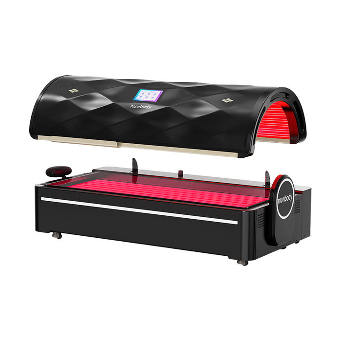 Closed rear side view of the Nuvibody PRO white red light therapy bed with curved dome and ergonomic structure.