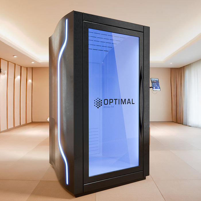 Stylish cryotherapy unit by Optimal Health in a wellness suite, showcasing premium design with LED accents and advanced freezing technology for recovery and rejuvenation.