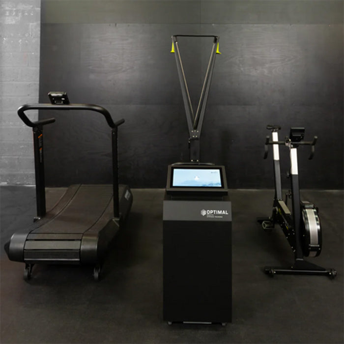 A full high-performance training station with a treadmill, rowing machine, and the Optimal Health Hypoxic Therapy Machine for altitude and endurance training.