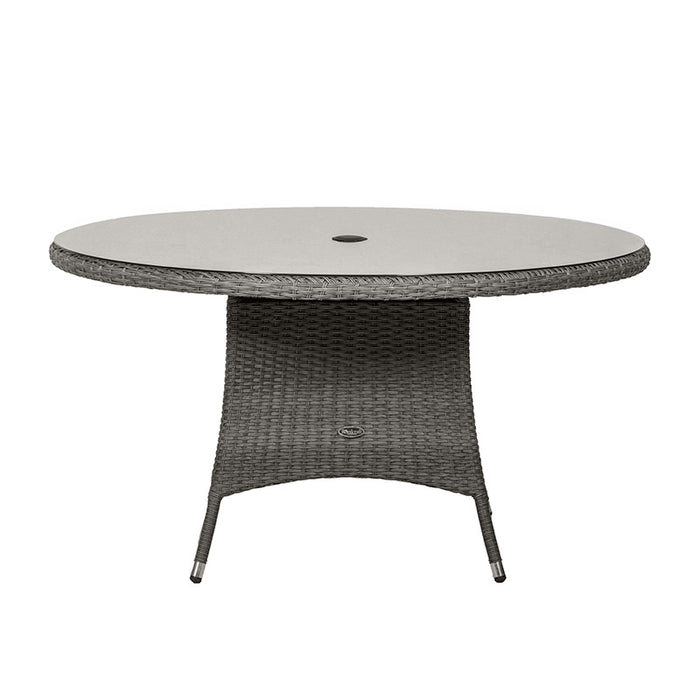 The Paris Imperial Round Dining Set’s round table, featuring a tempered glass top and a central hole for an umbrella, ideal for outdoor or indoor use.