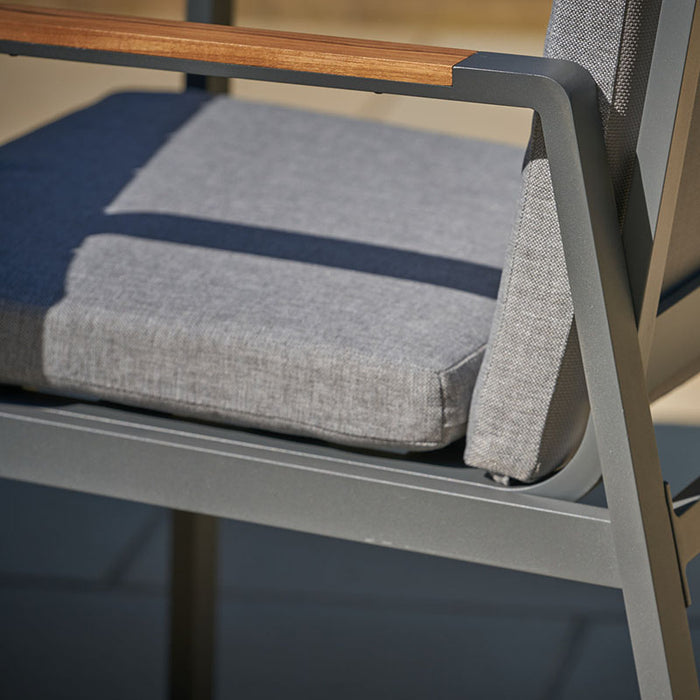Side view of Stockholm Dining Set chair with cushion.