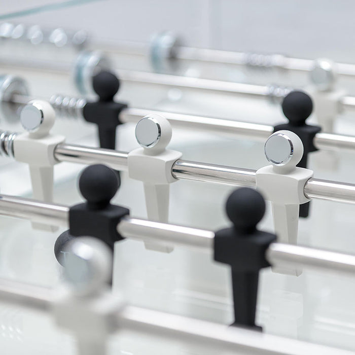 A close-up image of the player figurines and rods, highlighting the fine details and quality of materials used in the table's construction.