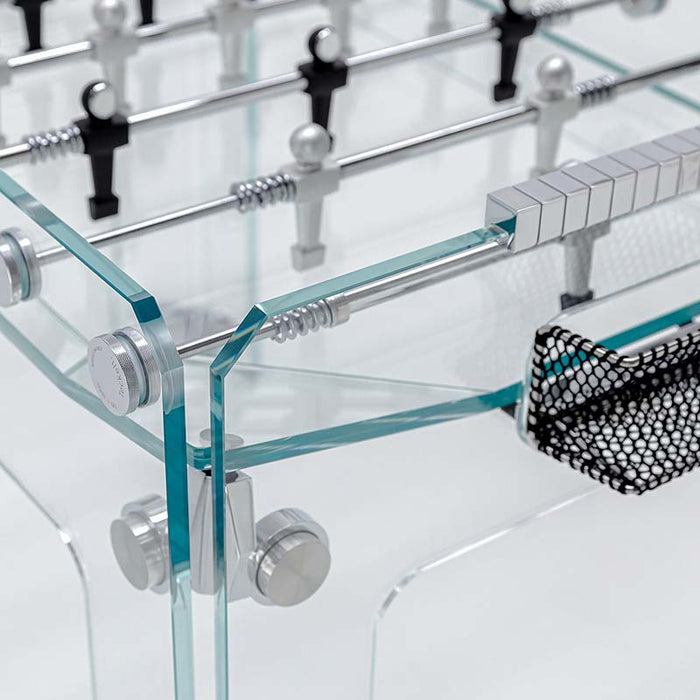 Close-up corner view of the Teckell Classic Foosball Table illustrating the precise construction and glass-to-metal connections.