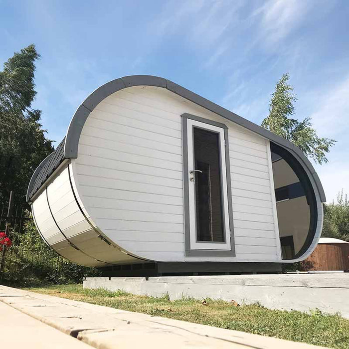 Diagonal angle of Delight Sauna in garden.