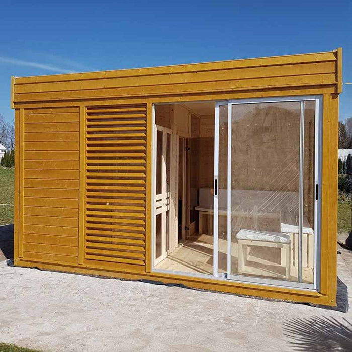 Front view of the Traditional Sauna Cube in garden setting.