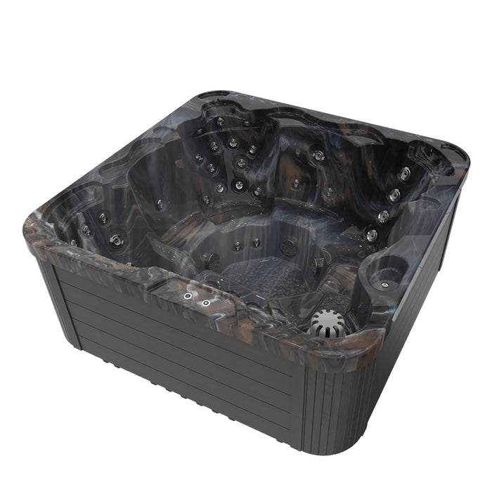 Wellis Sevilla Midnight Canyon Hot Tub viewed from the top side, revealing dark marble-effect shell with multiple jet points.