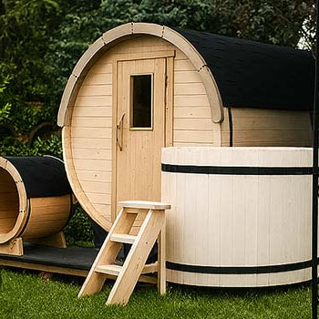 Barrel sauna and wooden ice bath in a lush flower garden with roses and archway.