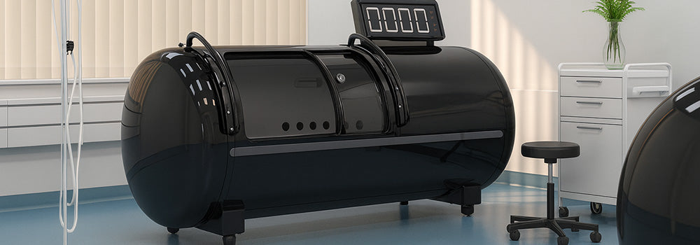 Black hyperbaric oxygen chamber in a modern clinical treatment room with soft lighting and minimal decor.