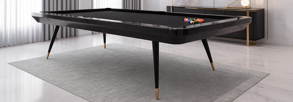 sleek modern black pool table with gold accents in a luxurious contemporary living room.
