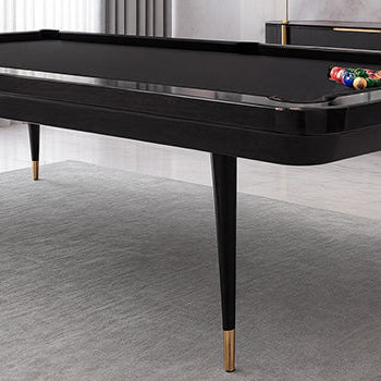 sleek modern black pool table with gold accents in a luxurious contemporary living room.