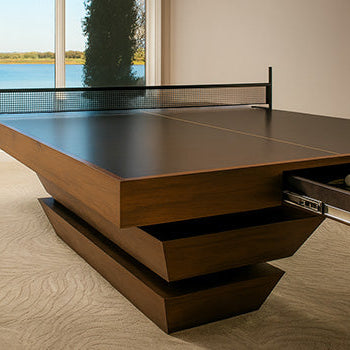 luxury dark wood ping pong table with storage drawer in a lakeside home gym with panoramic window views.
