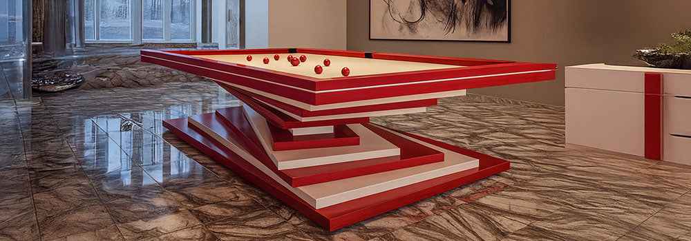 modern red and white designer pool table in a luxury marble-floored games room with pendant lighting and abstract wall art.
