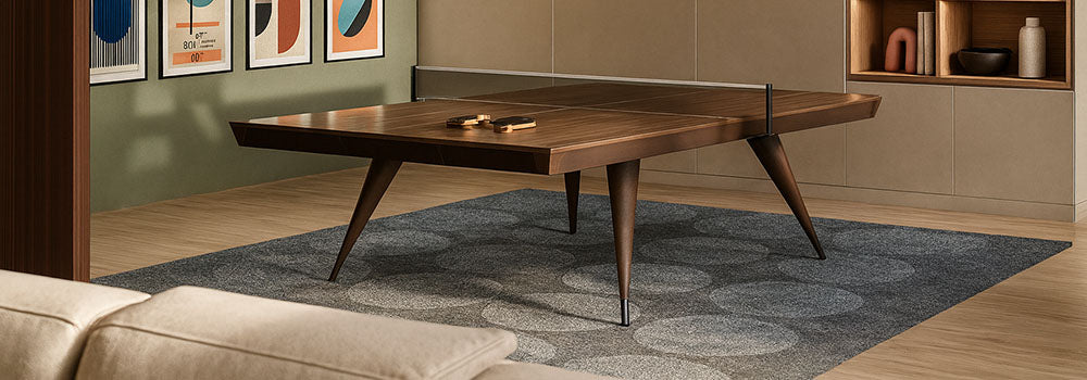 elegant table tennis table in a mid-century modern games room with abstract wall art and warm lighting.