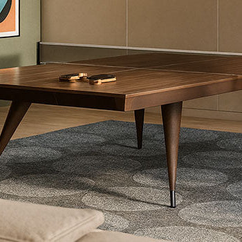 elegant table tennis table in a mid-century modern games room with abstract wall art and warm lighting.