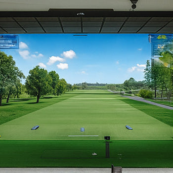 Luxury golf simulator room with plush sectional seating, wood panel walls, and a high-definition course screen.