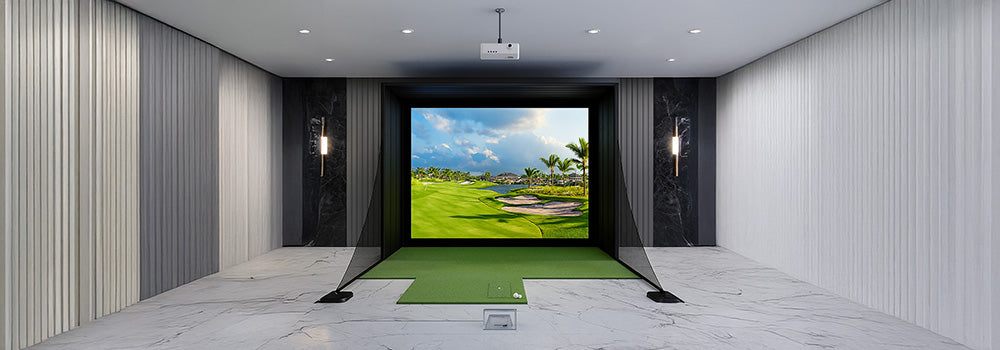 Modern indoor golf simulator with tropical fairway projection and marble flooring.