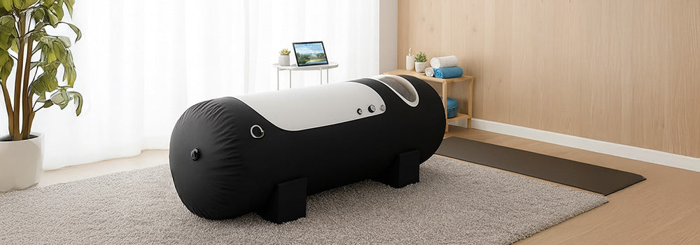 Sleek black and white hyperbaric oxygen chamber in a serene wellness room with soft lighting and modern decor.