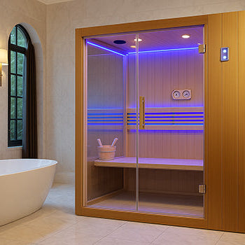 Modern indoor sauna with blue LED lighting in a luxury marble bathroom with freestanding tub.