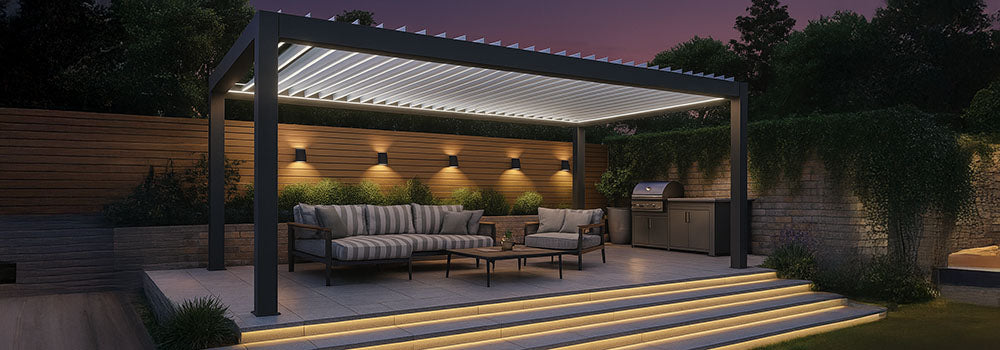 Evening pergola with striped cushioned seating and built-in lighting on a raised patio with illuminated steps.