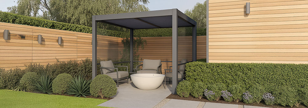 Modern pergola in a private garden corner with lounge seating and a white outdoor bathtub.