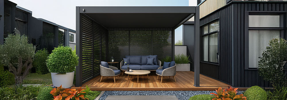 Modern pergola with slatted privacy panels and blue cushioned lounge set on wooden deck.