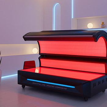 Futuristic spa room with glowing red light therapy bed and modern lighting.