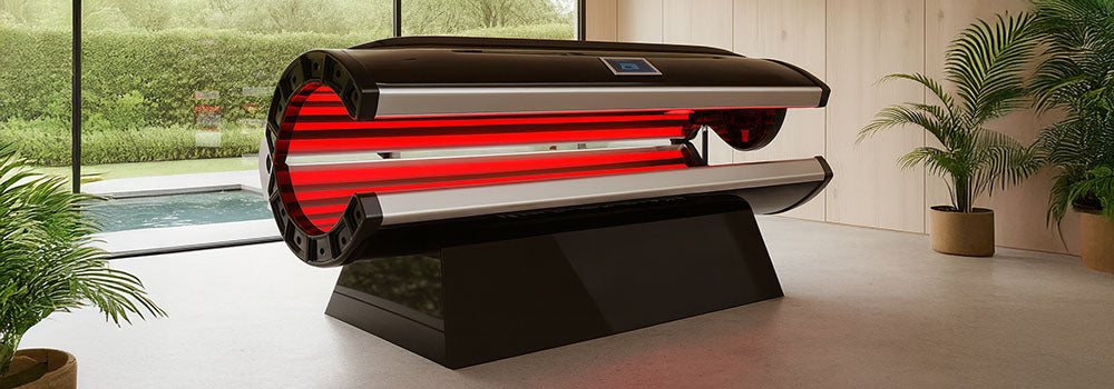 Red light therapy bed in a modern room with light wood walls, large windows, and garden view.