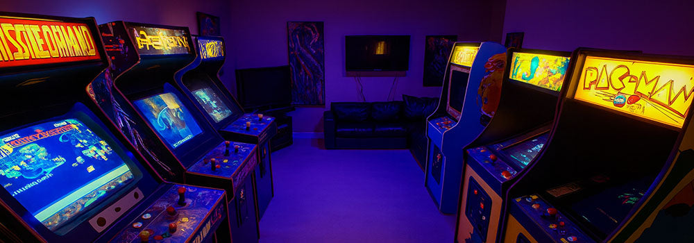 retro arcade room with rows of classic game machines lit by purple LED ceiling lights and vibrant screen displays.