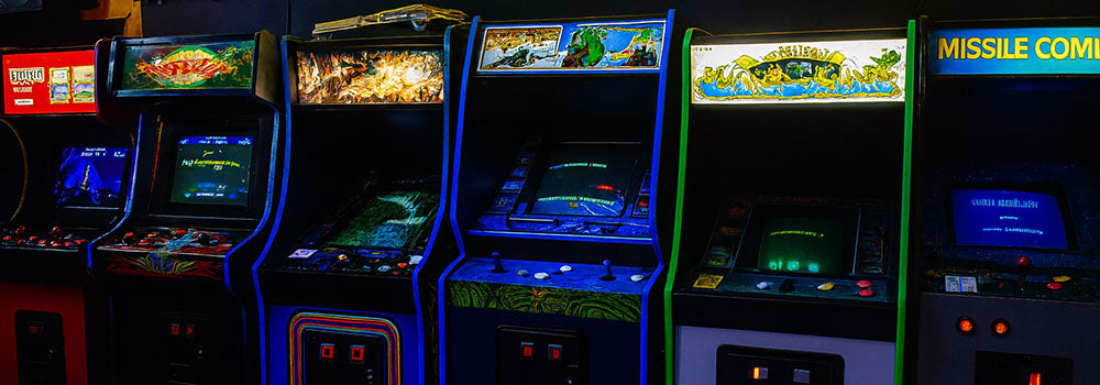 row of vintage arcade machines with glowing marquees and neon-lit carpet in a dark retro gaming arcade.