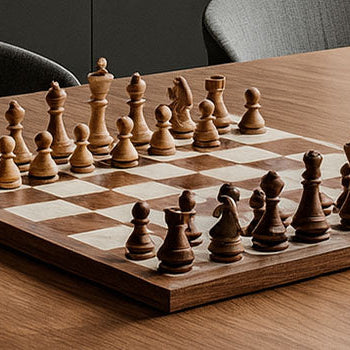Classic wooden chess set on minimalist dining table in neutral-toned modern interior.