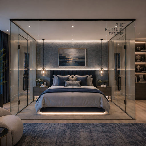 Altitude Centre MetraFit Sleep glass enclosure with black frame surrounding a double bed with navy blue bedding and pendant lights, installed in a luxury bedroom with city views at dusk.