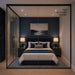 Altitude Centre MetraFit Sleep glass enclosure with black frame shown front-on, surrounding a double bed with navy headboard and white bedding, with floor-to-ceiling windows and city night view.