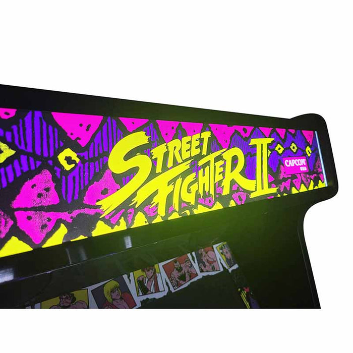 Close-up of the Street Fighter arcade marquee with vibrant graphics.