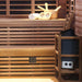 Corner view of Artize Bio Sauna with wooden bench and accessories.