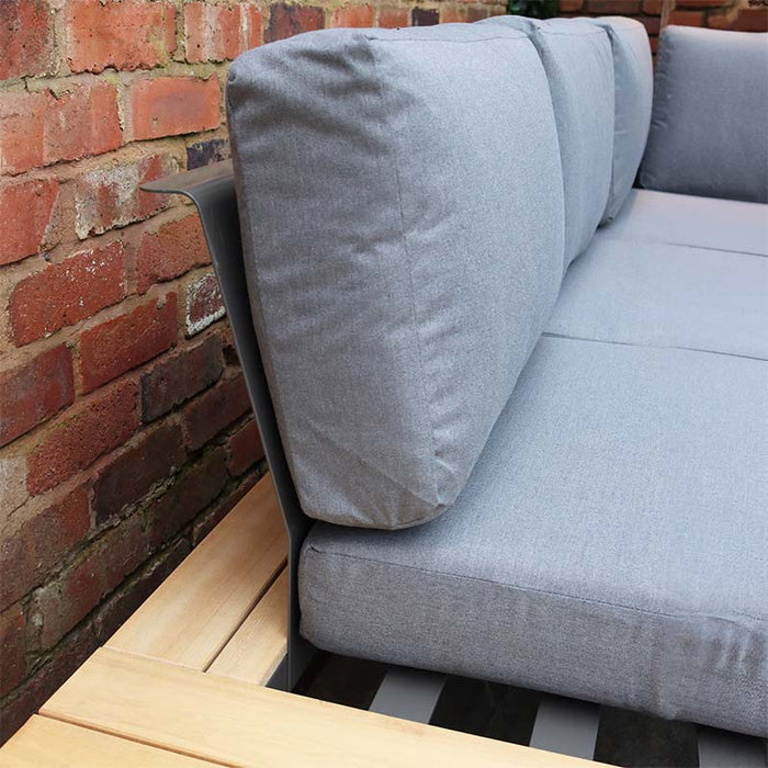 Side view of the Aspen 6 Seater Corner Lounge Set from Teak Wood, showcasing the premium grey cushions and robust teak wood frame, perfect for stylish garden lounging.