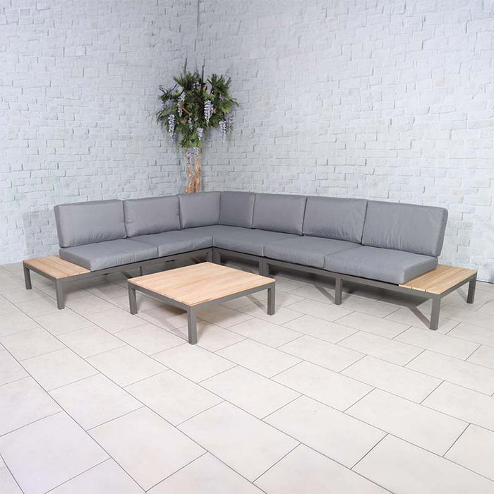 Aspen 6 Seater Corner Lounge Set in teak wood with grey cushions, designed for minimalist indoor decor with a natural touch.