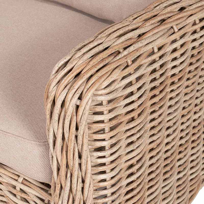 Detail of the rattan armrest design on the Barakaldo Natural Antique Outdoor Corner Set, showcasing craftsmanship and texture.