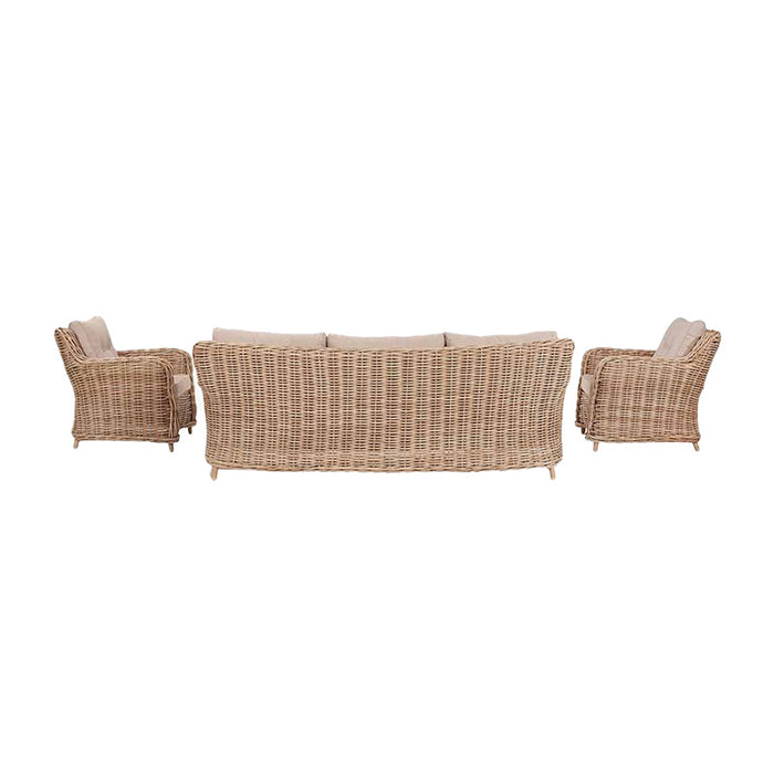 Barakaldo Natural Antique Outdoor Seating Set viewed from the back, highlighting the rattan weave and structure of the sofa and armchairs.