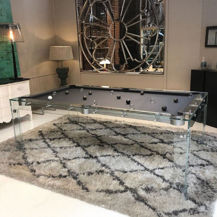 Glass Carat Light pool table with dark grey felt on a patterned rug in a contemporary vintage-themed room with decorative mirror.