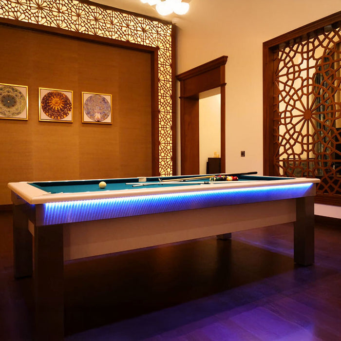 Luxurious setting with LED-lit Billards Toulet Lambert Competition Pool Table featuring blue cloth, paired with detailed wooden accents and decorative wall panels.