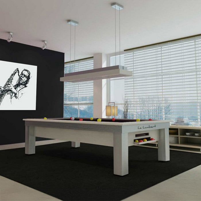 Bright, music-themed living area featuring the Billards Toulet Lambert Competition Pool Table in white finish with red and yellow balls, harmonising with modern art and decor.