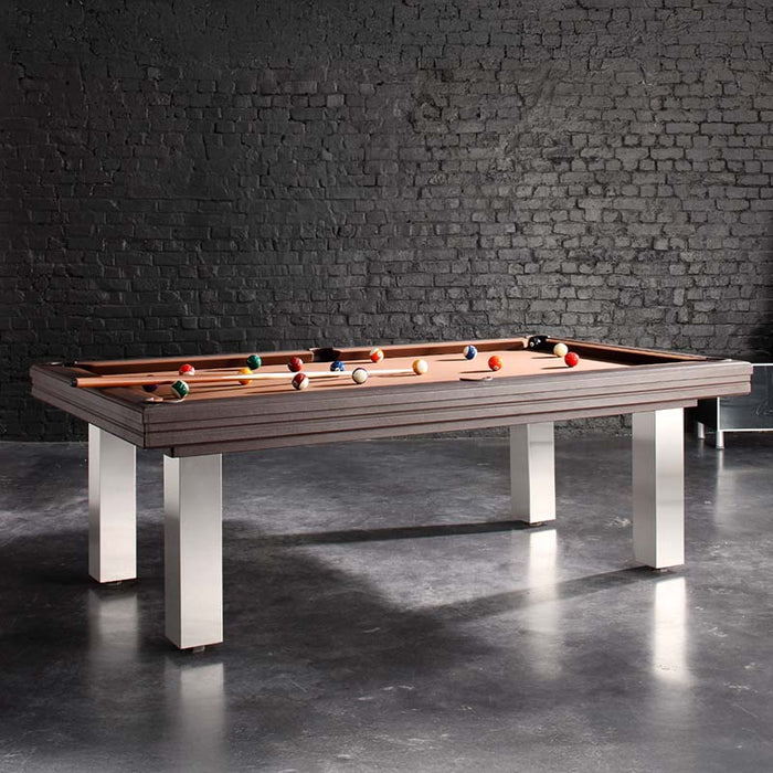 Luxurious taupe pool table in a chic industrial setting with matte black brick wall and modern accessories.