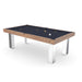 Billards Toulet Megeve modern pool table render with navy cloth and brushed chrome legs, combining sleek design with rustic charm.