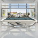 Bright white Billards Toulet Whitelight pool table placed in an airy, open-plan space with panoramic views and minimalist design, enhancing modern luxury.