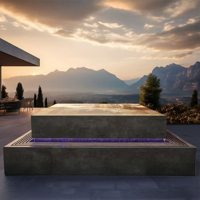 Chronos Cube 300 in a mountains setting at sunset, showcasing its luxurious design and glowing waterfall feature.