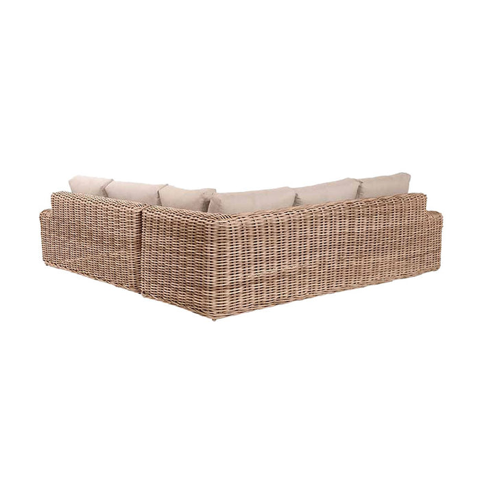 Back view of the Como Natural Antique Outdoor Corner Seating Set, emphasizing the sturdy rattan framework and seamless corner design, ideal for creating a cohesive garden look.